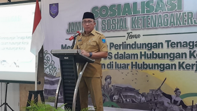 Wali Kota Ternate saat memberikan sambutan pada acara Sosialisasi Perlindungan sosial Ketenagakerjaan