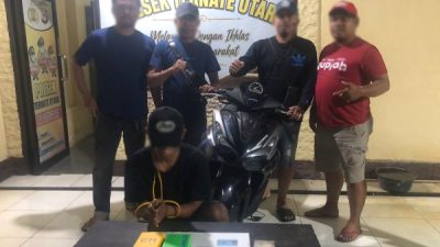 Terduga pelaku pencurian berinisial IHG (24) beserta barang bukti saat diamankan petugas di Mako Polsek Ternate Utara, (istimewa)